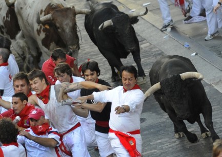 Pamplona bull run  topless girls flash boobs at san fermin